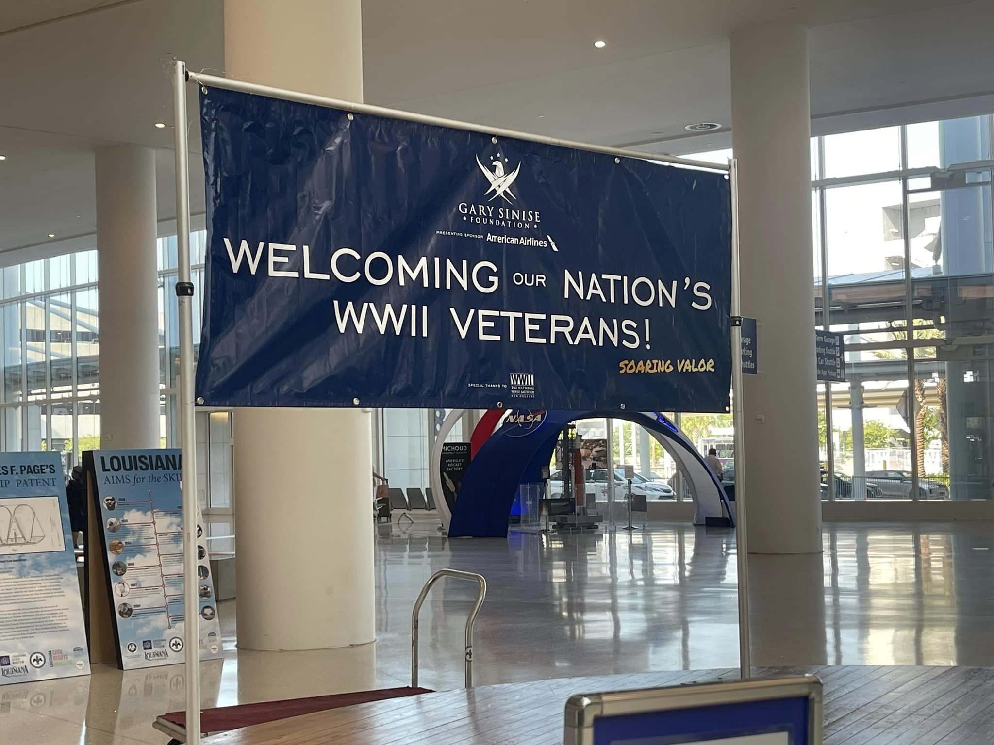 8-22-24 - 105th National Convention, New Orleans, LA - Signage seen by all upon arrival at the New Orleans Airport.