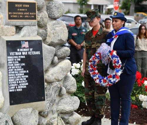 5-29-23 - Memorial Day Ceremony - Susan Ballenger, Unit 299 Eboard Member and Education Chairman, at Chino’s Community Bldg. placing a wreath in memory of servicemen.